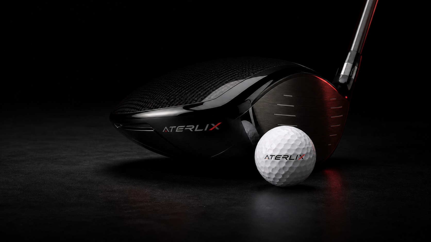 ATERLIX Tour TD golf ball beside black performance equipment